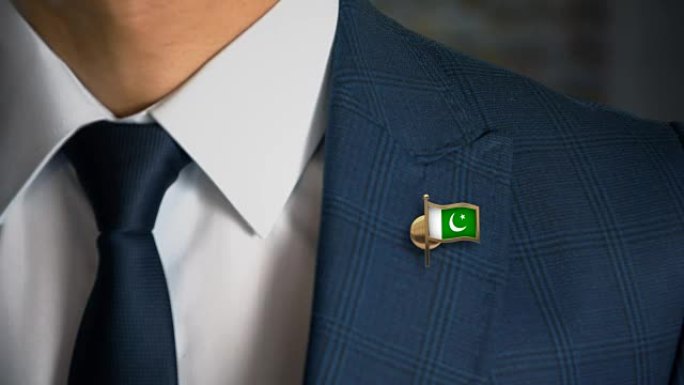 商人走向相机与国家国旗别针-巴基斯坦