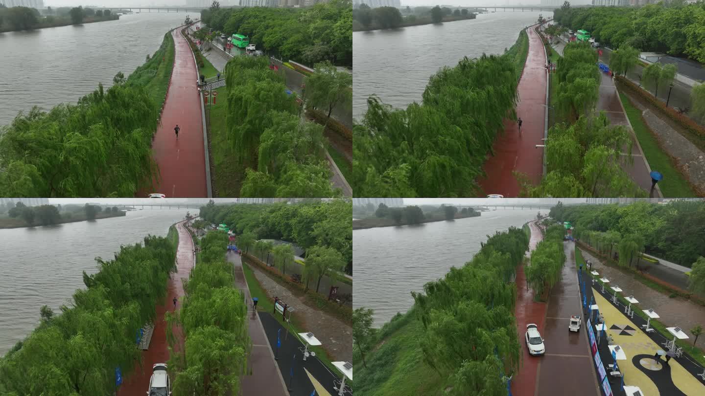 雨天迷你马拉松欢呼招手航拍城市欢乐跑