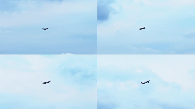 在蓝天白云的上空中自由飞翔翱翔的飞机客机