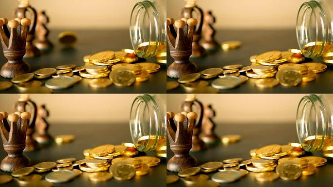 黑桌上有金币、象棋和旋转便士的特写静货。黄色硬币从罐子里掉了出来。