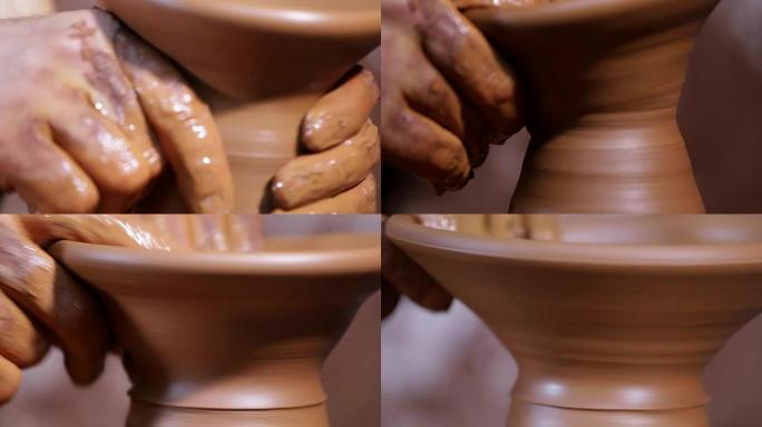 用陶轮用粘土制作手工陶器