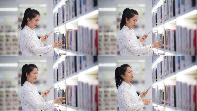 中年女性在图书馆阅读看书