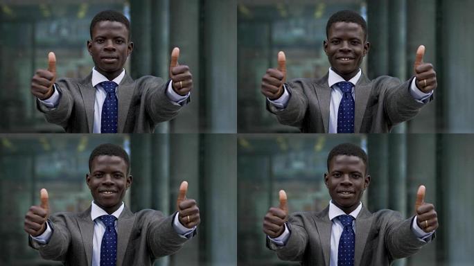 非洲黑人商人竖起两个大拇指。获胜，成功-户外