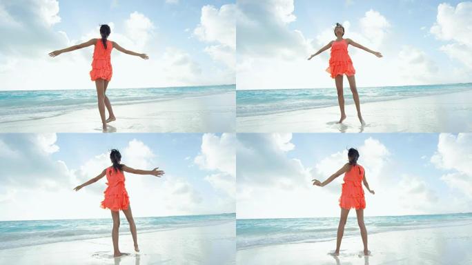 赤脚在热带海滩上无忧无虑的非洲裔美国女孩