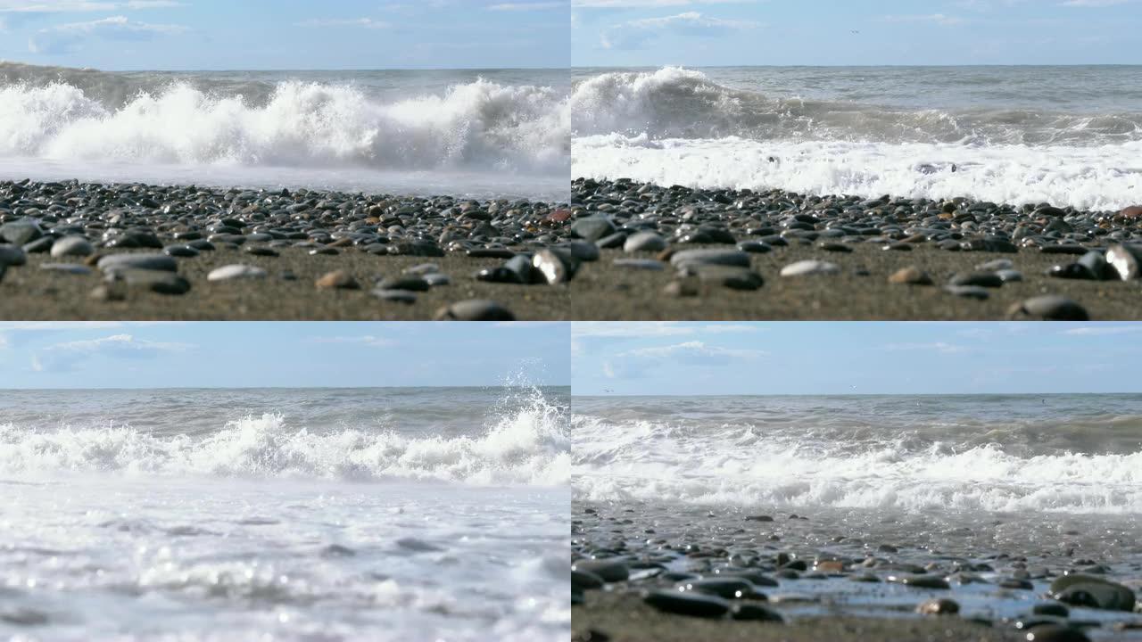 海上风暴。石岸的仰视图。巨大的海浪在海滩上撞击