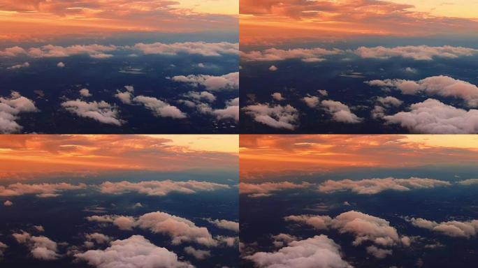 从飞机上看日出时天空中的彩云