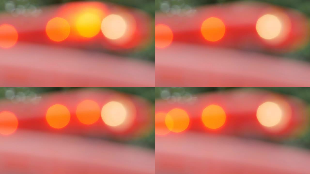 闪烁的红色发光二极管警报器灯在远处以软聚焦。