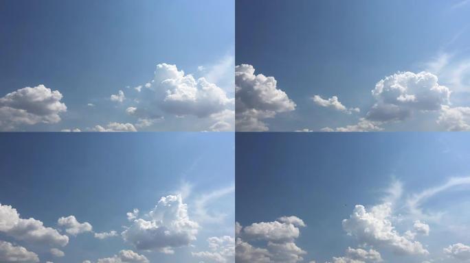 白云在蓝天上的烈日中消失。循环具有延时运动云，并以美丽的蓝天为后盾。延时运动云蓝天背景和太阳。