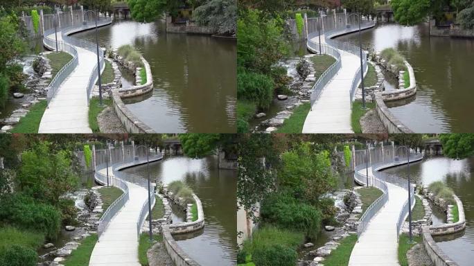 弯曲的圣安东尼奥河步道平移视频的高视图