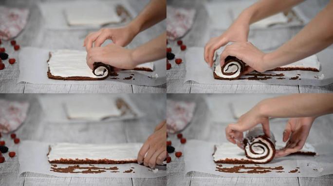用香草奶油和覆盆子制作巧克力瑞士卷。