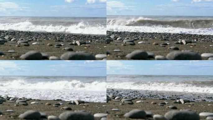 海上风暴。石岸的仰视图。巨大的海浪在海滩上撞击