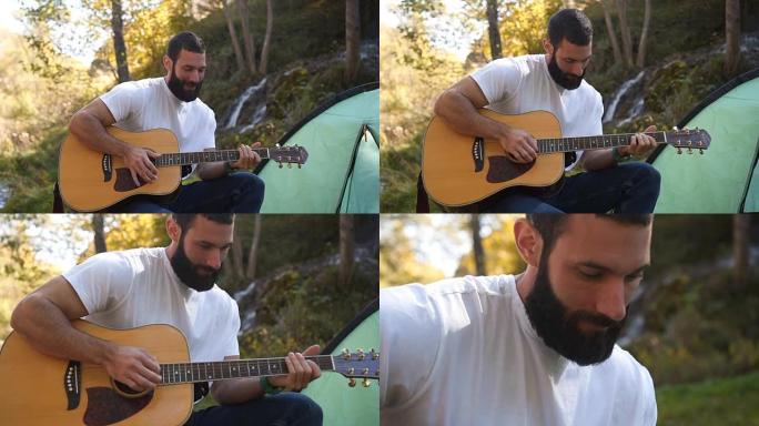 一个男人喜欢在露营时弹吉他