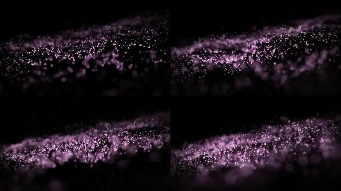 黑色背景上有星星的豪华颗粒紫罗兰色尘埃的4k运动抽象。背景紫罗兰色运动，无缝循环