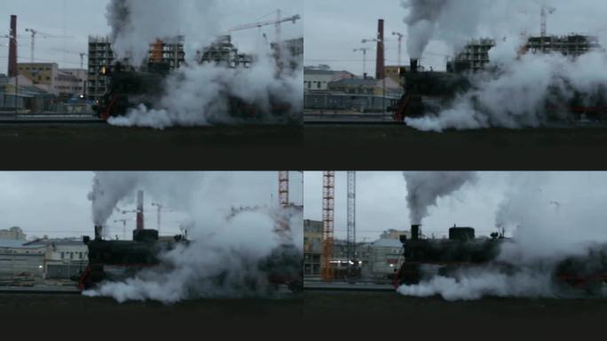 烟雾中的蒸汽机车的轮廓