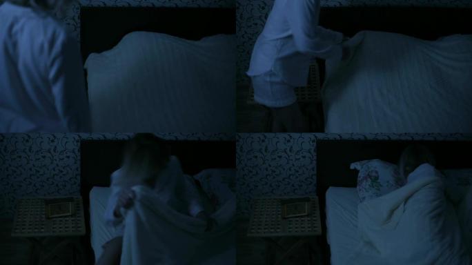 晚上穿着睡衣的中枪女孩上床睡觉。准备睡眠。美国之夜的影响。低调冷光模仿夜
