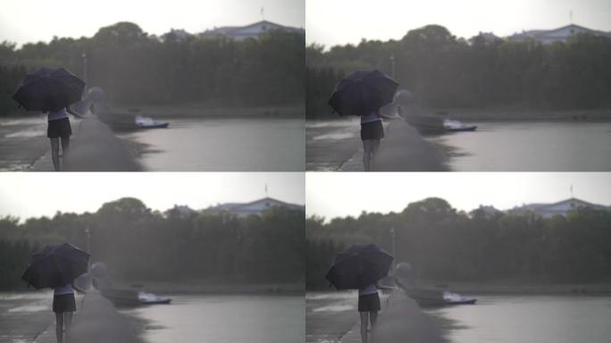 带伞的女孩在河边下雨的时候去，悲伤，想