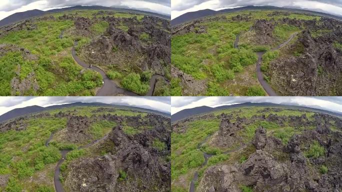 冰岛迪姆博吉尔。冰岛Myvatn湖附近奇异的Dimmuborgir熔岩层的荒芜火山景观