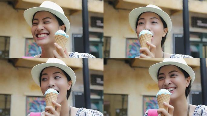 美女女游客戴帽子暑假吃冰淇淋