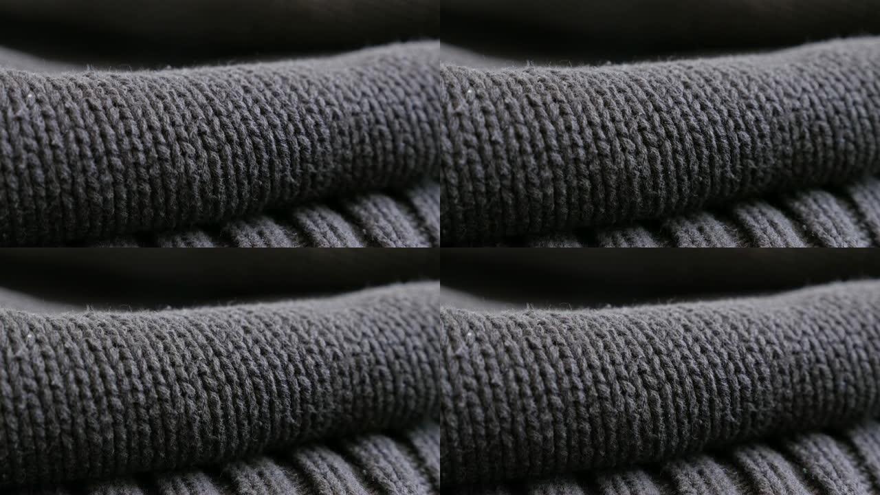 棕色男士毛衣的特写细节针织品4K 2160p 30fps超高清倾斜镜头-在温暖的羊毛罗纹或长筒袜针织