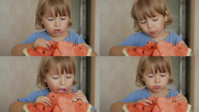 一个小男孩正在吃一个大西瓜。孩子的肖像吃西瓜片。4K UHD。