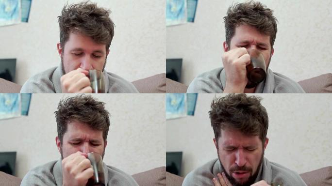 一个男人喝柠檬茶，然后咳嗽。他感冒，头痛，发热，发冷
