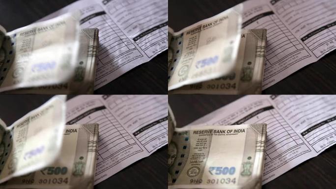 银行提款-带有印度500纸币的存单