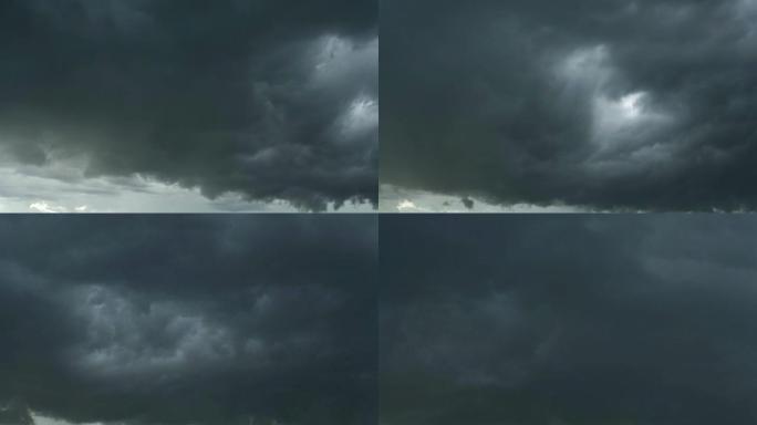 白色黑色和云彩天空的延时剪辑。暴风云正在形成黑色。