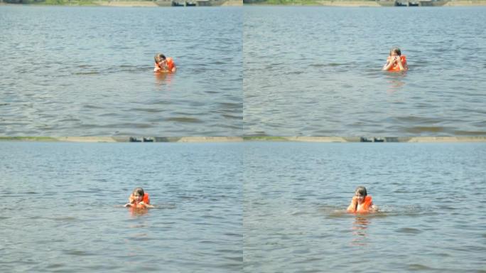 水中穿着救生衣的女孩