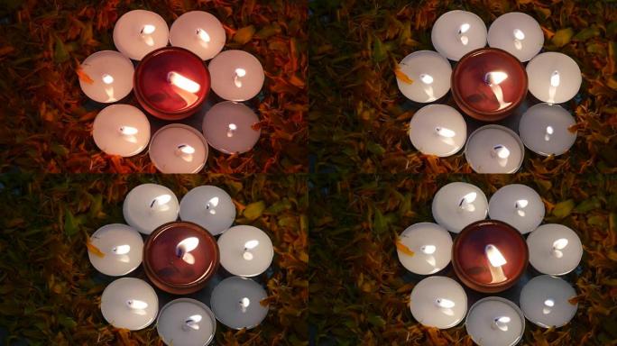 在排灯节“光的节日”上点亮的Diyas或印度陶制灯，周围是点燃的茶蜡烛