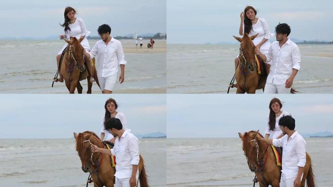 4k的夫妇步行者在热带度假享受海滩和快乐的退休夫妇，在海边骑马的年轻女子
