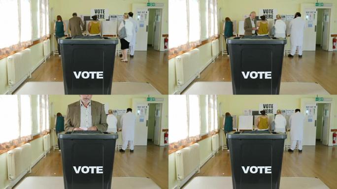 4K:选民在选举的投票箱内投票-在投票站/地点投票