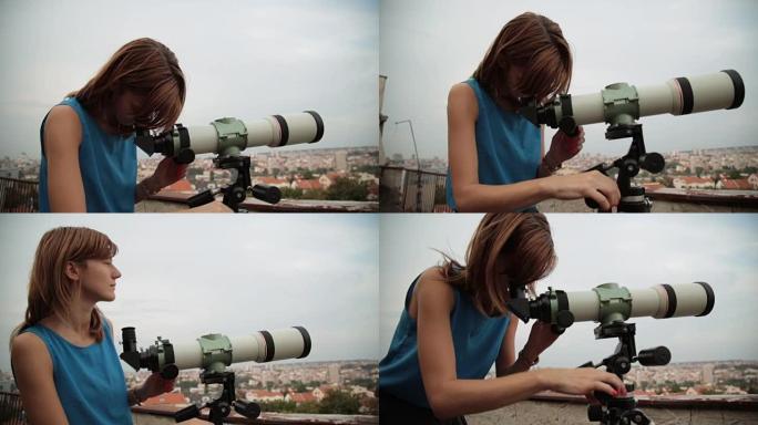 年轻女子用天文望远镜看着天空。