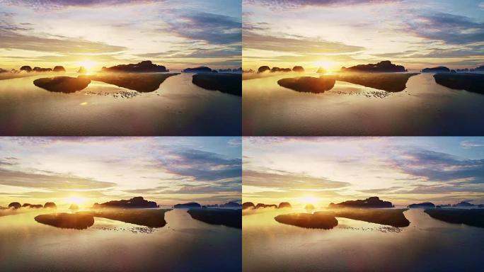 鸟瞰图无人机拍摄了早晨在泰国攀牙省的Ban Sam Chong Tai村美丽的日出