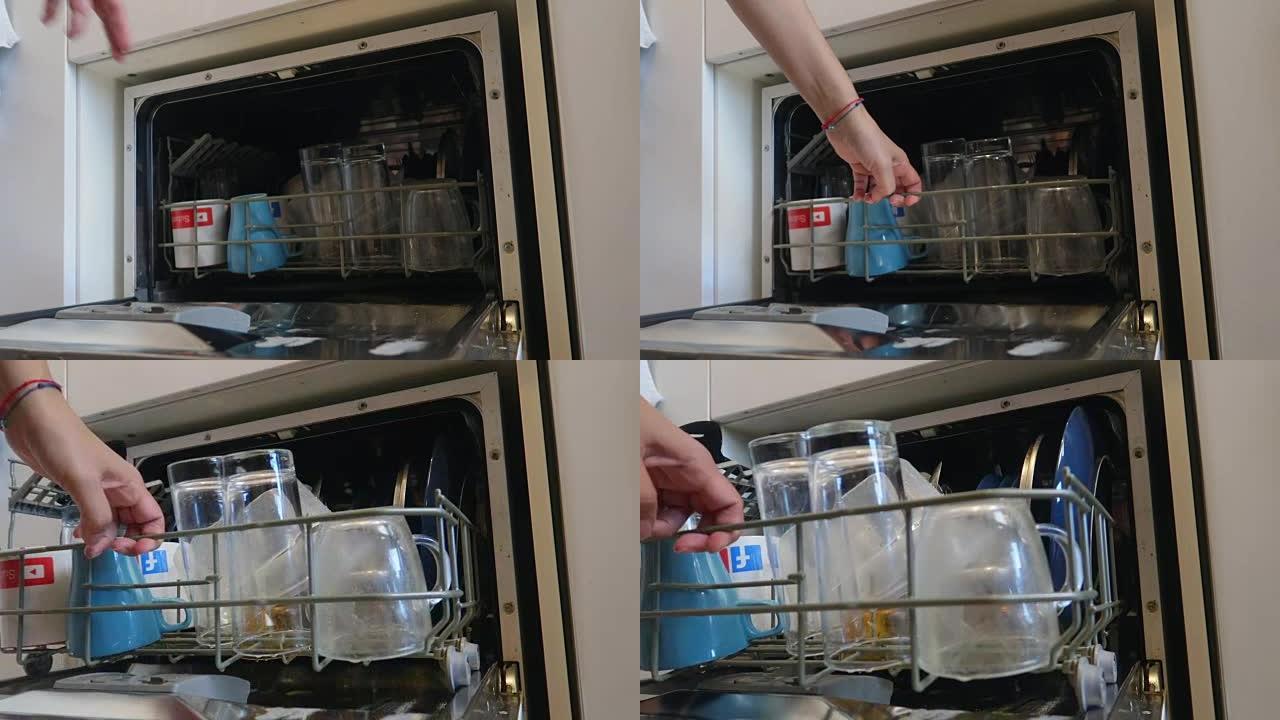 女人装载洗碗机-库存视频