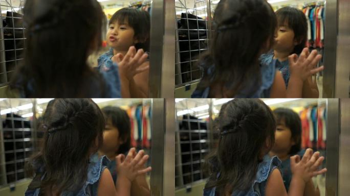 亚洲女孩喜欢在镜子前穿布