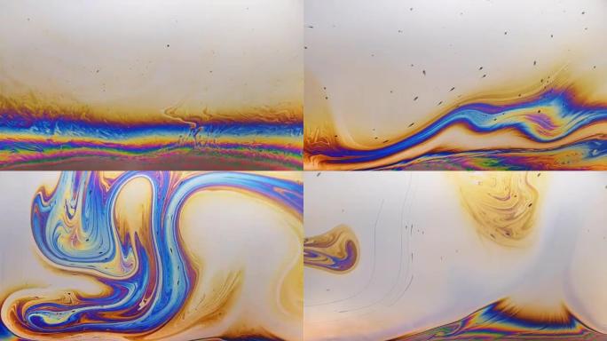 液体4k视频表面的真实视频彩虹运动抽象图案
