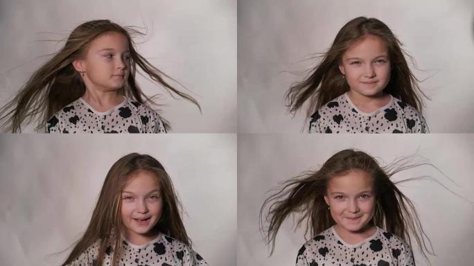 快乐的小女孩飘动着头发。