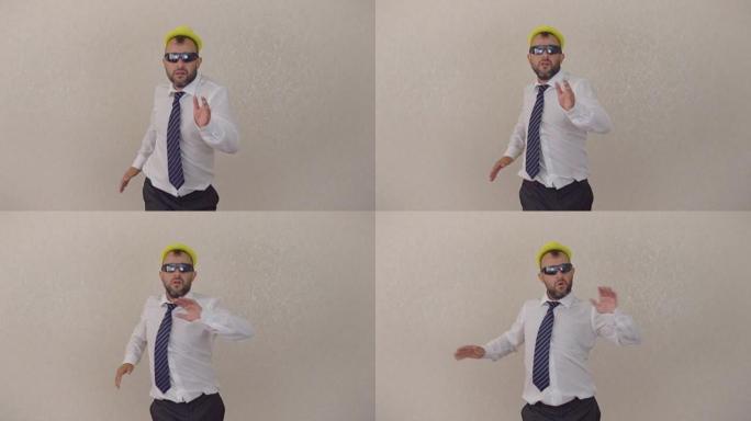 疯狂快乐的商人穿着西装在公司办公室跳舞庆祝成就