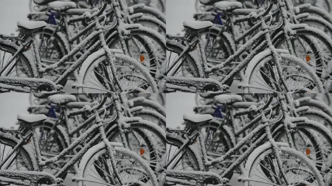 芬兰停车场积雪覆盖的自行车
