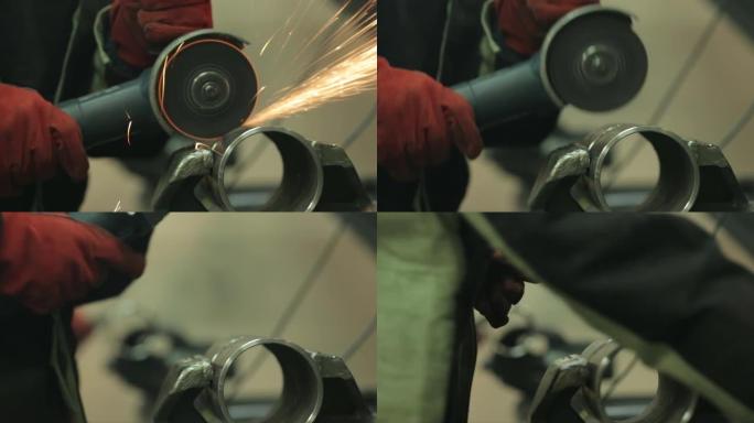 一位戴着红色手套的锁匠借助金属车间的研磨机清洁一段钢管上的焊缝