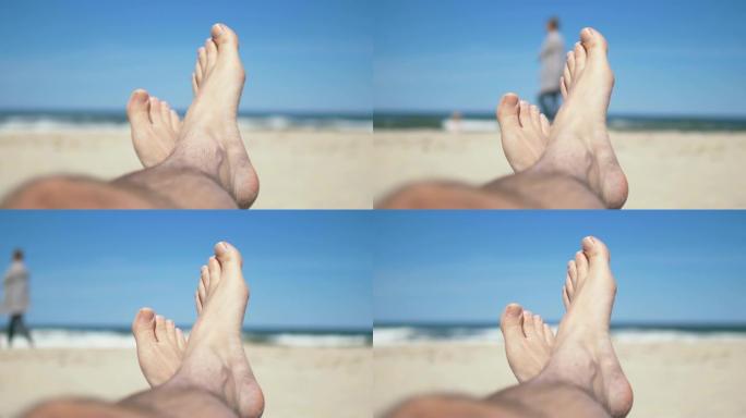 男子以4k分辨率慢动作60fps躺在沙滩上