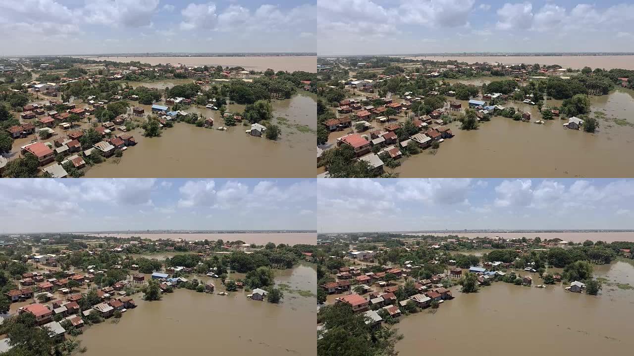无人机视图: 在季风雨中飞越洪水泛滥的村庄