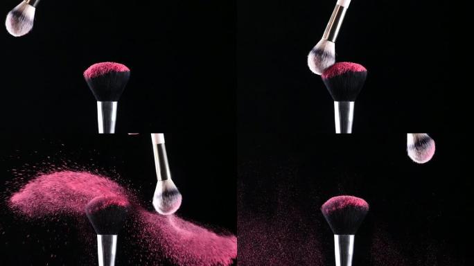 两个化妆刷相撞，产生彩色粉末1的爆炸
