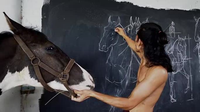一位亚洲 (泰国) 男子正在练习，素描，绘画，在黑墙上画一匹美丽的马