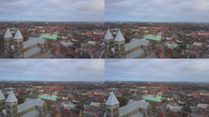 隆德大教堂建筑鸟瞰图(Skåne，瑞典南部)。4K无人机飞过隆德市的历史教堂地标
