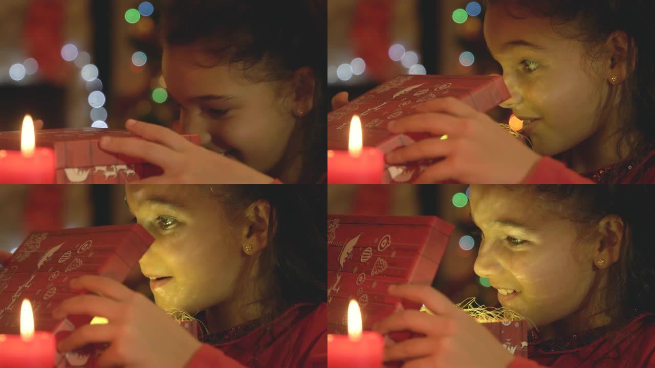 年轻的小女孩打开礼品盒，用金色的魔法光看着里面。