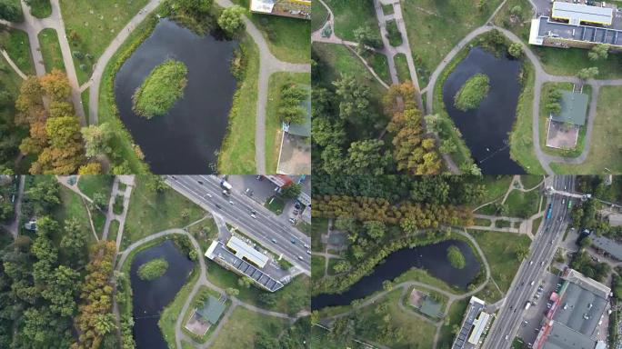空中无人机飞行镜头: 从道路上看到带有油渍的湖泊。