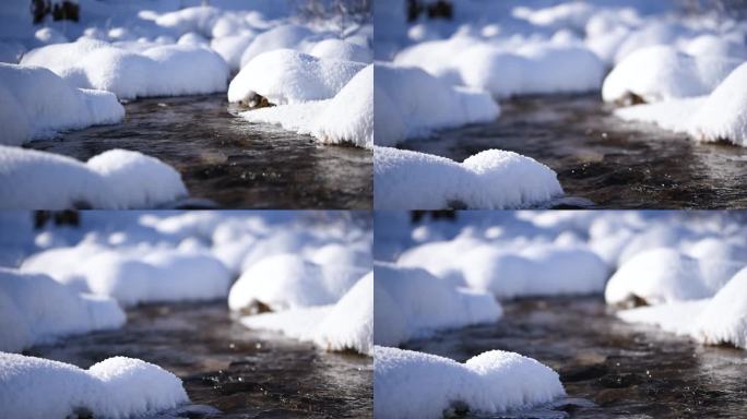 冬天雪地里的河流虚实焦转换特写