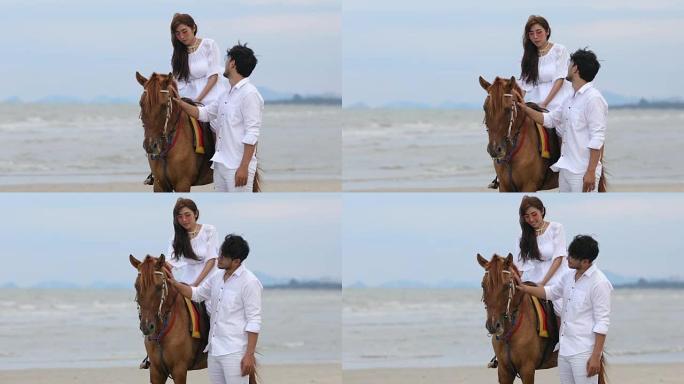 4k的夫妇步行者在热带度假享受海滩和快乐的退休夫妇，在海边骑马的年轻女子
