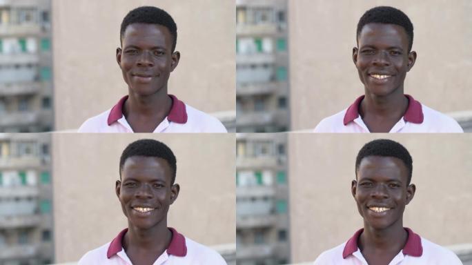幸福，快乐。年轻的美国非洲裔男子在户外摄像机前微笑